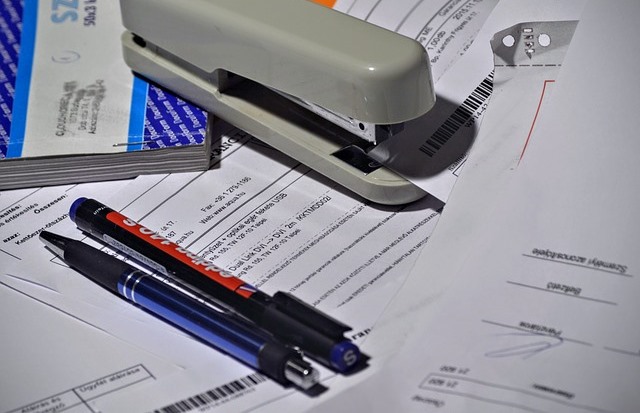 Stapler on top of the documents