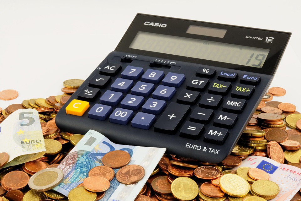 Calculator on top of coins